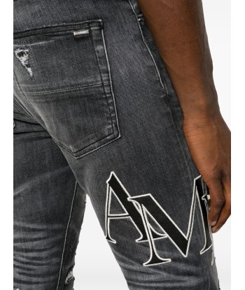 Logo Print Ripped Skinny Jeans en linge