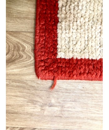 Tapis vintage en boucles de laine en stock